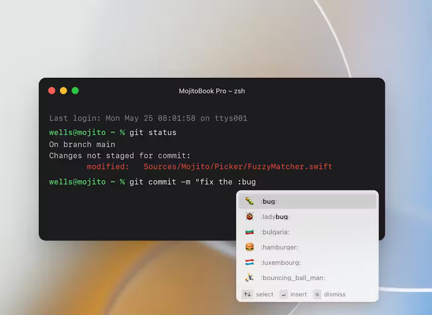 Mojito's inline emoji autocomplete open in macOS Terminal, suggesting :bug: inside a git commit command